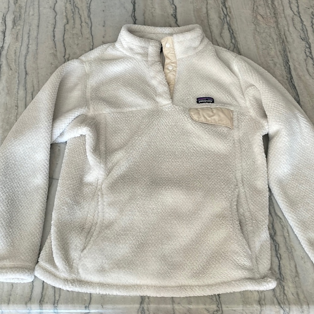 Patagonia pull-over fleece.  Color: off-white Size: large (size 12).